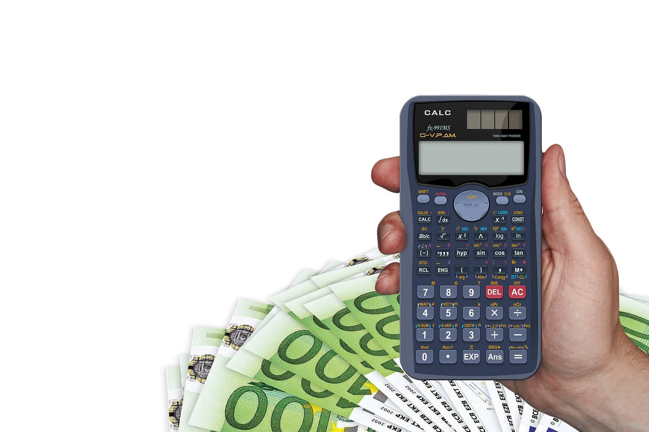 Illustrazione della regola del budget 50-30-20 con diagramma a torta che mostra la suddivisione delle spese: 50% necessità, 30% desideri, 20% risparmio